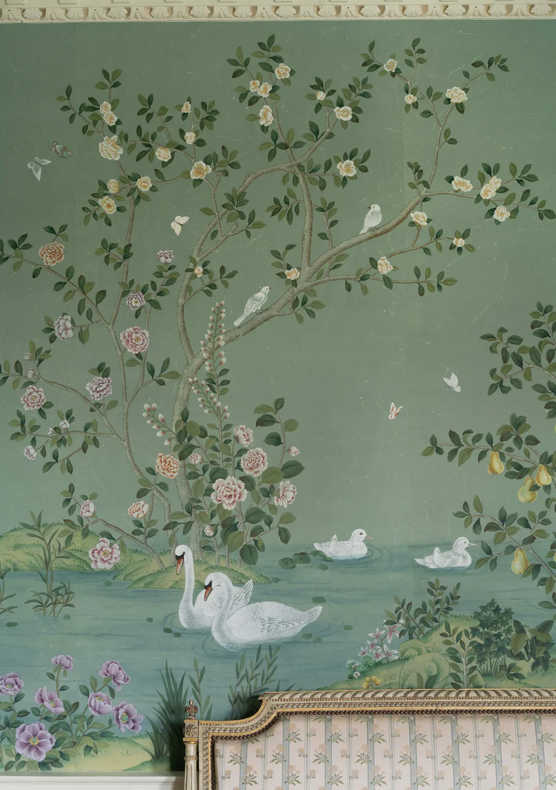 De Gournay hand-painted green botanical wallpaper with flowering branches and birds